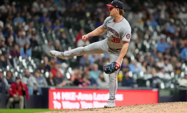 Washington Nationals' Clayton Beeter pitches during the ninth inning of a baseball game against the Milwaukee Brewers, Saturday, April 11, 2026, in Milwaukee. (AP Photo/Aaron Gash)