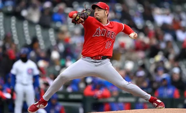 Los Angeles Angels starter Yusei Kikuchi delivers a pitch during the first inning of a baseball game against the Chicago Cubs in Chicago, Wednesday, April 1, 2026. (AP Photo/Paul Beaty)