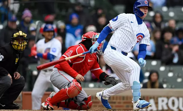 Chicago Cubs' Pete Crow-Armstrong watches his RBI single during the third inning of a baseball game against the Los Angeles Angels in Chicago, Wednesday, April 1, 2026. (AP Photo/Paul Beaty)