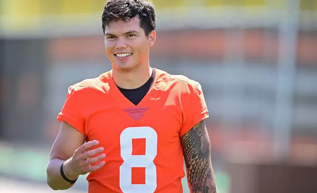 Cleveland Browns quarterback Dillon Gabriel walks off the field after an NFL football practice, Tuesday, April 21, 2026, in Berea, Ohio. (AP Photo/David Dermer)