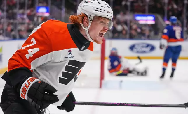 Philadelphia Flyers' Owen Tippett (74) celebrates after scoring a goal during the first period of an NHL hockey game against the New York Islanders Friday, April 3, 2026, in Elmont, N.Y. (AP Photo/Frank Franklin II)