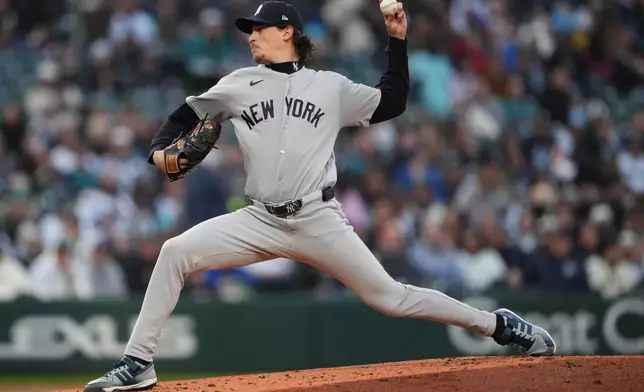 New York Yankees starting pitcher Max Fried throws against the Seattle Mariners during the first inning of a baseball game, Tuesday, March 31, 2026, in Seattle. (AP Photo/Lindsey Wasson)