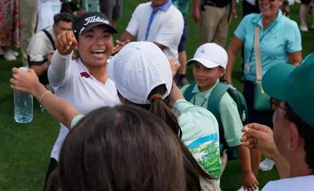 Maria José Marin, of Colombia, celebrates her win after the Augusta National Women's Amateur golf tournament, Saturday, April 4, 2026, in Augusta, Ga. (AP Photo/David J. Phillip)