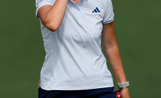 Asterisk Talley reacts after missing a putt on the second hole during the Augusta National Women's Amateur golf tournament, Saturday, April 4, 2026, in Augusta, Ga. (AP Photo/David J. Phillip)