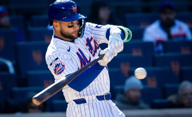 New York Mets' Bo Bichette (19) bats during the first inning of a baseball game against the Arizona Diamondbacks, Wednesday, April 8, 2026, in New York. (AP Photo/Angelina Katsanis)
