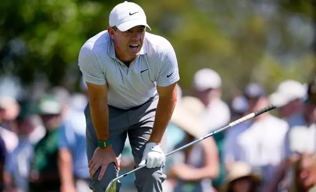 Rory McIlroy, of Northern Ireland, watches his tee shot on the fourth hole during the second round of the Masters golf tournament at the Augusta National Golf Club, Friday, April 10, 2026, in Augusta, Ga. (AP Photo/Ashley Landis)