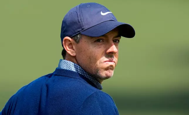 Rory McIlroy, of Northern Ireland, watches on the second hole during the first round of the Masters golf tournament at the Augusta National Golf Club, Thursday, April 9, 2026, in Augusta, Ga. (AP Photo/Gerald Herbert)