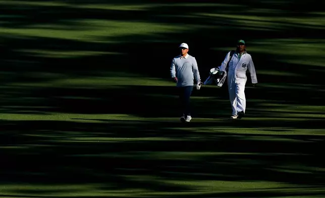 Kurt Kitayama walks to green on the second hole during the first round of the Masters golf tournament at the Augusta National Golf Club, Thursday, April 9, 2026, in Augusta, Ga. (AP Photo/David J. Phillip)