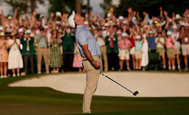 Rory McIlroy, of Northern Ireland, celebrates after winning the Masters golf tournament at the Augusta National Golf Club, Sunday, April 12, 2026, in Augusta, Ga. (AP Photo/Eric Gay)
