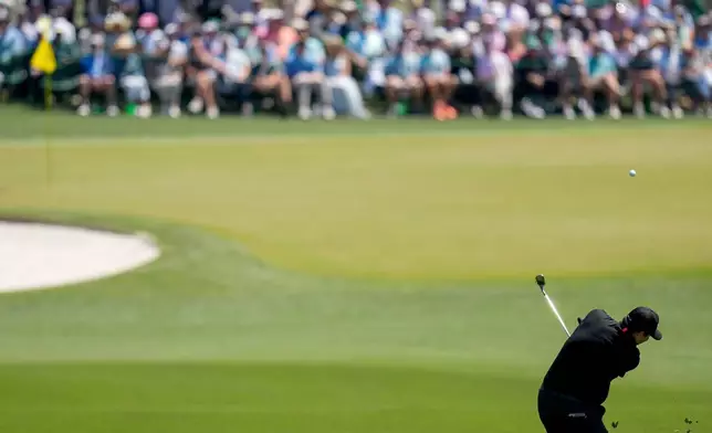 Patrick Reed hits from the fairway on the second hole during the second round of the Masters golf tournament at the Augusta National Golf Club, Friday, April 10, 2026, in Augusta, Ga. (AP Photo/Eric Gay)
