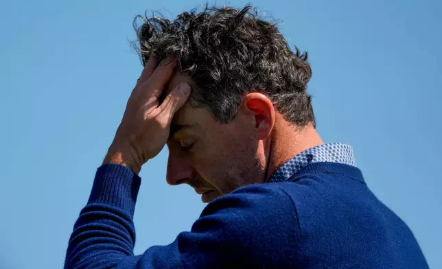 Rory McIlroy, of Northern Ireland, leaves the green on the 18th hole after his first round of the Masters golf tournament at the Augusta National Golf Club, Thursday, April 9, 2026, in Augusta, Ga. (AP Photo/Matt Slocum)