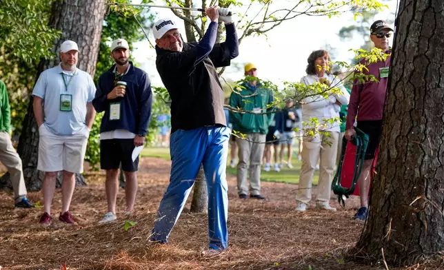 Jose Maria Olazabal, of Spain, hits from the pine straw on the second hole during the first round of the Masters golf tournament at the Augusta National Golf Club, Thursday, April 9, 2026, in Augusta, Ga. (AP Photo/Ashley Landis)