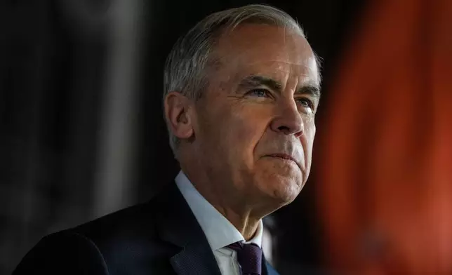 Prime Minister Mark Carney prepares to make an announcement in Brampton, Ont. on Tuesday April 7 2026. T ( Chris Young/The Canadian Press via AP)/The Canadian Press via AP)