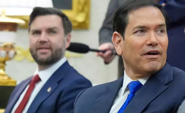 Vice President JD Vance, left, and Secretary of State Marco Rubio attend a meeting in the Oval Office at the White House, March 3, 2026, in Washington. (AP Photo/Mark Schiefelbein, file)