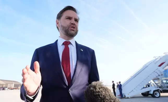 Vice President JD Vance speaks to the press before boarding Air Force Two, Friday, April 10, 2026, at Joint Base Andrews, Md., for expected departure to Pakistan, for talks on Iran. (AP Photo/Jacquelyn Martin, pool)