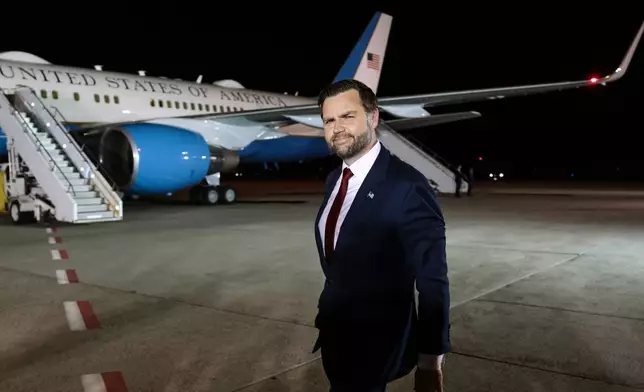 Vice President JD Vance pauses after speaking to reporters before boarding Air Force Two to return to Washington, at Budapest Ferenc Liszt International Airport in Budapest, Hungary, Wednesday, April 8, 2026. (Jonathan Ernst/Pool via AP)