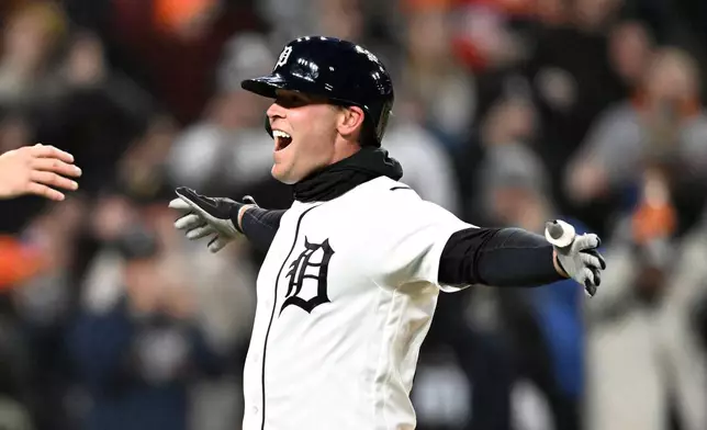 Detroit Tigers' Kerry Carpenter reacts after hitting a two-run home run in the third inning of a baseball game against the St. Louis Cardinals, Sunday, April 5, 2026, in Detroit. (AP Photo/Jose Juarez)