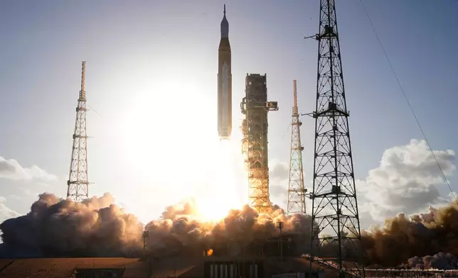 The NASA Artemis II SLS (Space Launch System) rocket with the Orion spacecraft launches at the Kennedy Space Center, Wednesday, April 1, 2026, in Cape Canaveral, Fla. (AP Photo/Chris O'Meara) CORRECTION: photographer is Chris O'Meara, not John Raoux