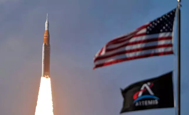 NASA's Artemis II moon rocket lifts off from the Kennedy Space Center's Launch Pad 39-B Wednesday, April 1, 2026, in Cape Canaveral, Fla. (AP Photo/John Raoux)