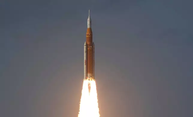 NASA's Artemis II moon rocket lifts off from the Kennedy Space Center's Launch Pad 39-B Wednesday, April 1, 2026, in Cape Canaveral, Fla. (AP Photo/Chris O'Meara)