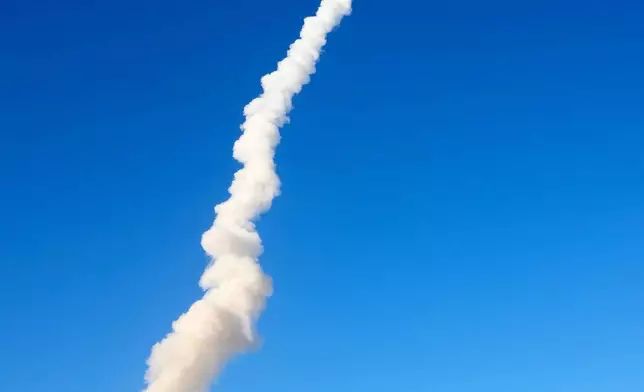 NASA's Artemis II moon rocket lifts off from the Kennedy Space Center's Launch Pad 39-B Wednesday, April 1, 2026, in Cape Canaveral, Fla. (AP Photo/Chris O'Meara)