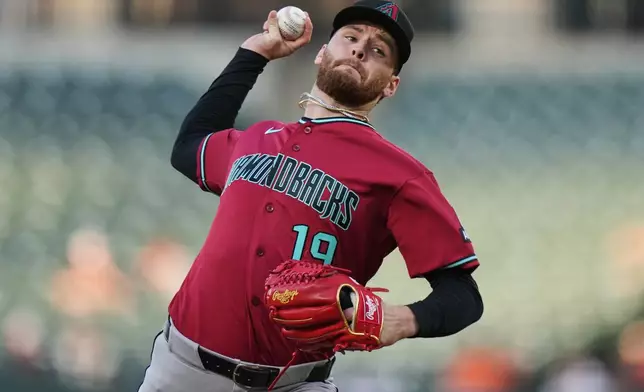 Arizona Diamondbacks starting pitcher Ryne Nelson delivers during the first inning of a baseball game against the Baltimore Orioles, Monday, April 13, 2026, in Baltimore. (AP Photo/Stephanie Scarbrough)
