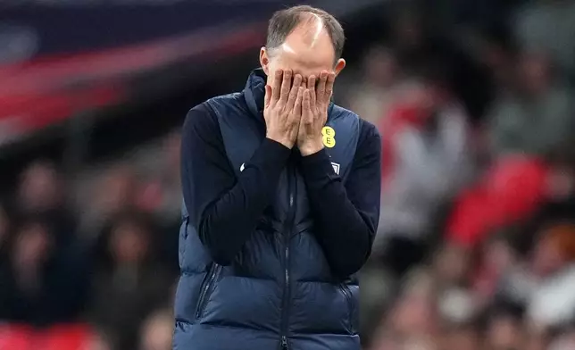 England's head coach Thomas Tuchel reacts during the International friendly soccer match between England and Japan in London, Tuesday, March 31, 2026 . (AP Photo/Kirsty Wigglesworth)