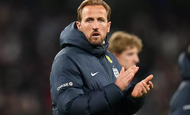 England's Harry Kane reacts after his team lost the International friendly soccer match between England and Japan in London, Tuesday, March 31, 2026 . (AP Photo/Kirsty Wigglesworth)