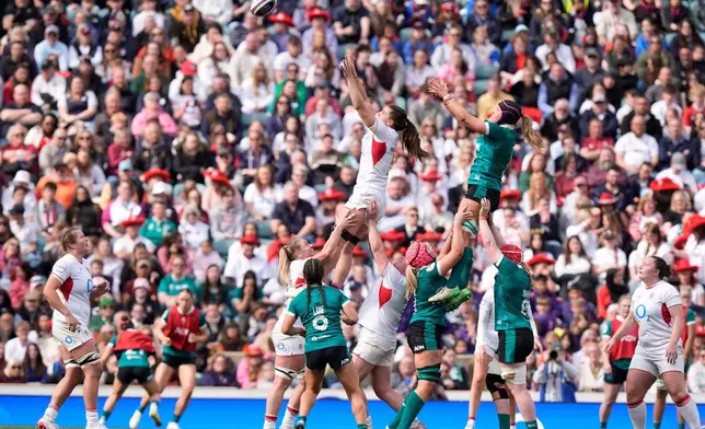 England's Lilli Ives Campion, top left, wins a line-out during the Women's Six Nations Rugby 2026 match between England and Ireland, in London, Saturday, April 11, 2026. (Andrew Matthews/PA via AP)