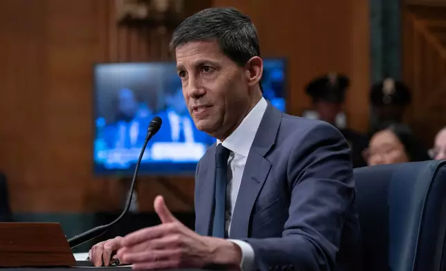 Kevin Warsh testifies during his nomination hearing to be a member and chairman of the Federal Reserve Board of Governors before the Senate Banking, Housing and Urban Affairs Committee on Capitol Hill, in Washington Tuesday, April 21, 2026. (AP Photo/Jose Luis Magana)