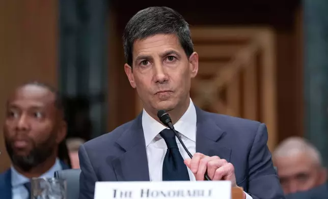 Kevin Warsh testifies during his nomination hearing to be a member and chairman of the Federal Reserve Board of Governors before the Senate Banking, Housing and Urban Affairs Committee on Capitol Hill, in Washington Tuesday, April 21, 2026. (AP Photo/Jose Luis Magana)