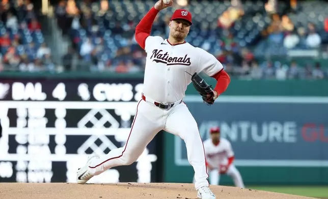 Washington Nationals pitcher Cade Cavalli throws during the first inning of a baseball game against the St. Louis Cardinals, Tuesday, April 7, 2026, in Washington. (AP Photo/Daniel Kucin Jr.)
