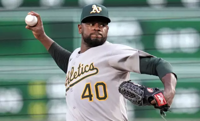 FILE - Athletics pitcher Luis Severino delivers during the first inning of a baseball game against the Pittsburgh Pirates, in Pittsburgh, Sept. 19, 2025. (AP Photo/Gene J. Puskar, File)