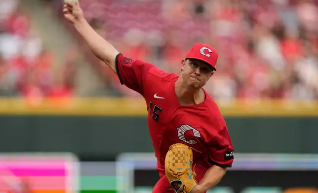 Cincinnati Reds pitcher Emilio Pagán throws during the ninth inning of a baseball game against the Los Angeles Angels in Cincinnati, Saturday, April 11, 2026. (AP Photo/Carolyn Kaster)