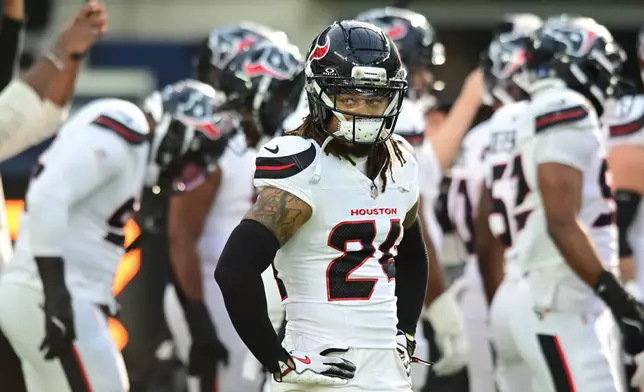 FILE - Houston Texans cornerback Derek Stingley Jr. (24) stands on the field before an NFL football game against the Los Angeles Chargers in Inglewood, Calif., Saturday, Dec. 27, 2026. (AP Photo/Wally Skalij, File)