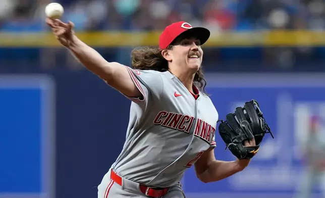 Cincinnati Reds pitcher Rhett Lowder delivers to the Tampa Bay Rays during the first inning of a baseball game Monday, April 20, 2026, in St. Petersburg, Fla. (AP Photo/Chris O'Meara)