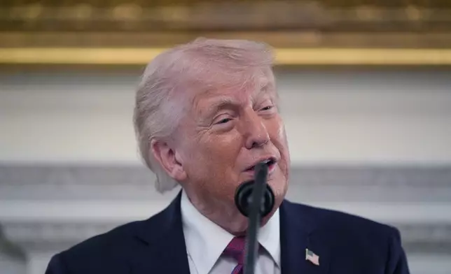 President Donald Trump speaks during an event for NCAA national champions in the State Dining Room of the White House, Tuesday, April 21, 2026, in Washington. (AP Photo/Alex Brandon)