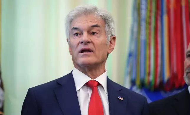 Centers for Medicare &amp; Medicaid Services administrator Dr. Mehmet Oz speaks speaks during an event on health care affordability in the Oval Office at the White House, Thursday, April 23, 2026, in Washington. (AP Photo/Mark Schiefelbein)