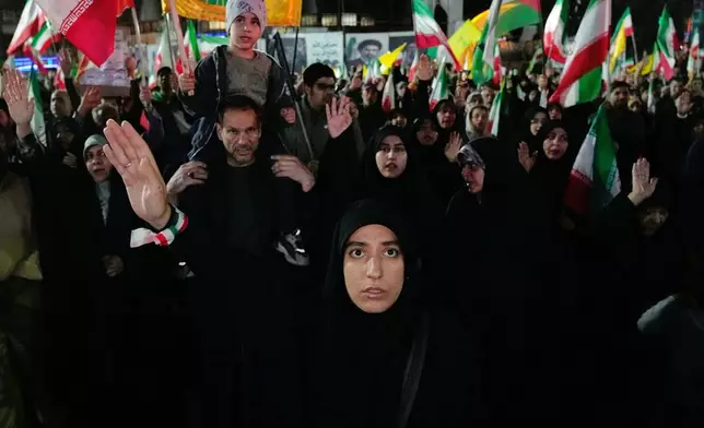 Pro-government demonstrators attend a gathering in Tehran, Iran, Monday, April 27, 2026. (AP Photo/Vahid Salemi)