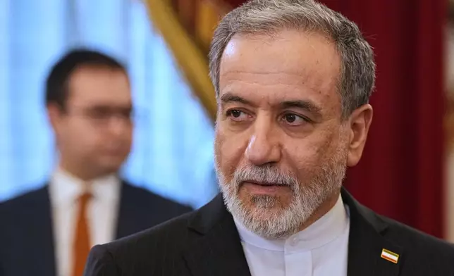 Iranian Foreign Minister Abbas Araghchi arrives to attend the talks with Russian President Vladimir Putin at the Boris Yeltsin Presidential Library, in St. Petersburg, Russia, Monday, April 27, 2026. (AP Photo/Dmitri Lovetsky, Pool)