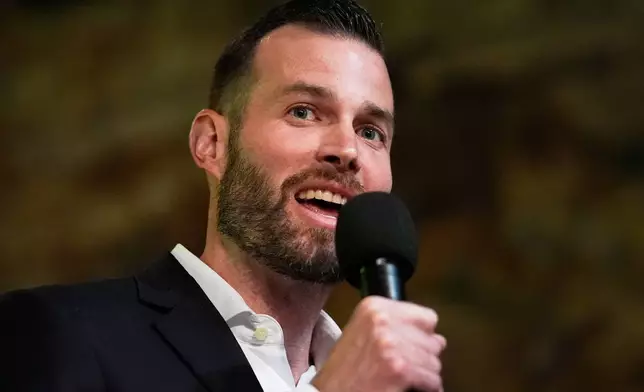 Republican Clay Fuller speaks during an election night watch party after winning a special election for Georgia's 14th Congressional District, Tuesday, April 7, 2026, in Ringgold, Ga. (AP Photo/Mike Stewart)