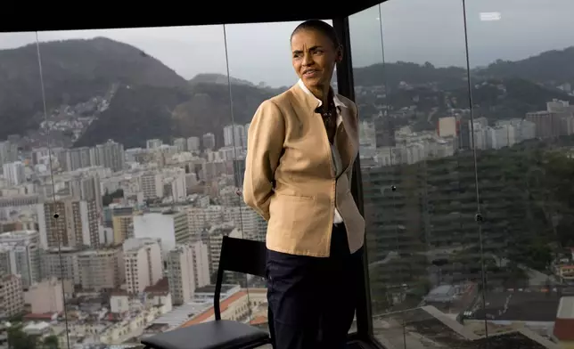 FILE - Marina Silva, presidential candidate of the Brazilian Socialist Party, arrives to an interview with The Associated Press in Rio de Janeiro, Brazil, Sept. 17, 2014. (AP Photo/Silvia Izquierdo, File)
