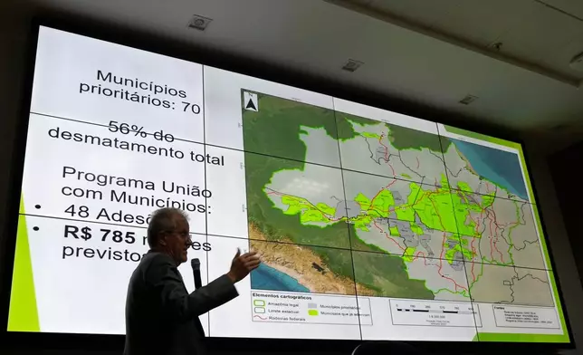 FILE - Environment Ministry Executive Secretary Joao Paulo Ribeiro Capobianco presents Amazon and Cerrado deforestation data at the ministry headquarters in Brasilia, Brazil, Aug. 7, 2024. (AP Photo/Eraldo Peres, File)