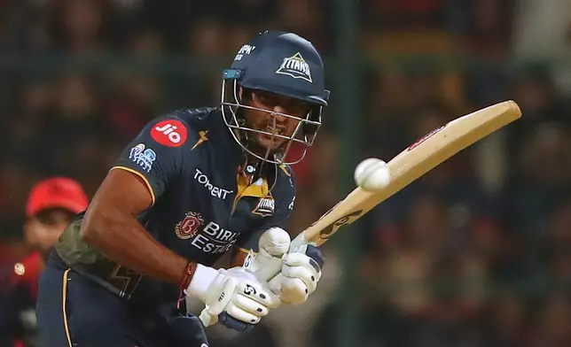 Gujarat Titans' Sai Sudharsan plays a shot during the Indian Premier League cricket match between Royal Challengers Bengaluru and Gujarat Titans in Bengaluru, India, Friday, April 24, 2026. (AP Photo)