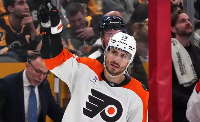 Philadelphia Flyers' Garnet Hathaway celebrates after scoring during the second period of Game 2 in the first round of the NHL Stanley Cup playoffs against the Pittsburgh Penguins in Pittsburgh, Monday, April 20, 2026. (AP Photo/Gene J. Puskar)
