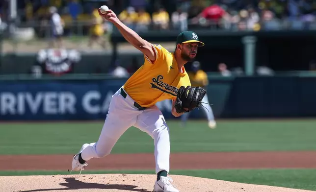 Athletics pitcher Luis Morales throws to the Houston Astros during the first inning of a baseball game Saturday, April 4, 2026, in West Sacramento, Calif. (AP Photo/Sara Nevis)