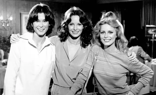FILE - Cast members Kate Jackson, from left, Jaclyn Smith and Cheryl Ladd pose on the set of "Charlie's Angels" in Los Angeles in March 1978. (AP Photo/George Brich, File)