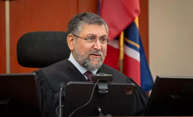 Commissioner Russell Minas talks to council during a hearing on a protective order sought by a former partner against Taylor Frankie Paul, in 3rd District Court, Tuesday, April 7, 2026, in Salt Lake City. (Rick Egan/The Salt Lake Tribune via AP, Pool)