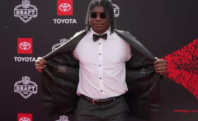 Texas Tech linebacker David Bailey poses on the red carpet before the first round of the NFL football draft, Thursday, April 23, 2026, in Pittsburgh. (AP Photo/Gene J. Puskar)