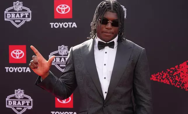 Texas Tech linebacker David Bailey poses on the red carpet before the first round of the NFL football draft, Thursday, April 23, 2026, in Pittsburgh. (AP Photo/Gene J. Puskar)